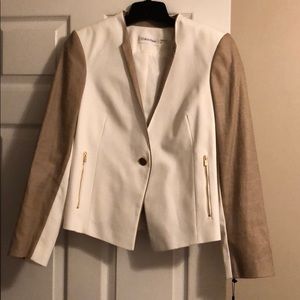 Cream and tweed blazer.